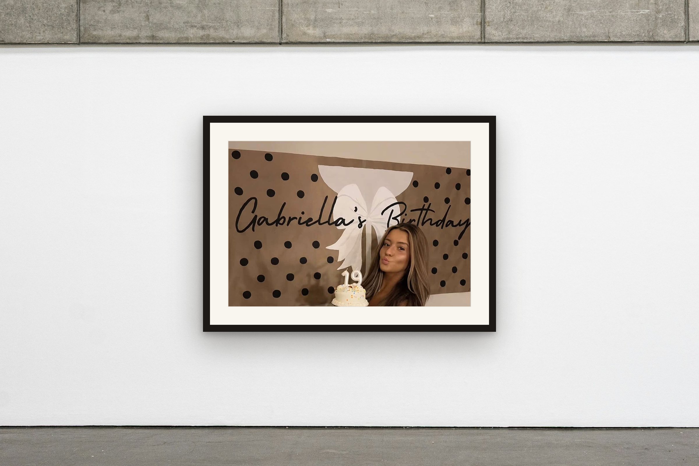 The White Bow hung on a gallery wall